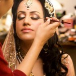 Bridal smoky eye makeup with pink dress