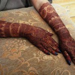 Filling bridal mehndi designs