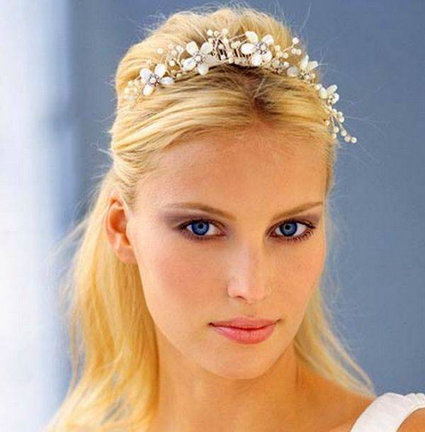 Back tied open hairstyle with floral headpiece